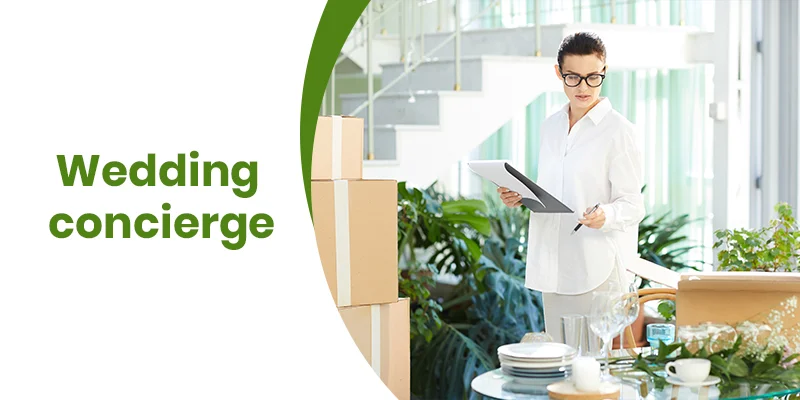 A woman holding a clipboard stands next to packed boxes and a set table in a bright room with greenery. The text Wedding concierge services is elegantly displayed on the left side.